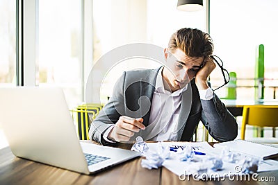 Accountant businessman working with documents in office having a stress. Stock Photo