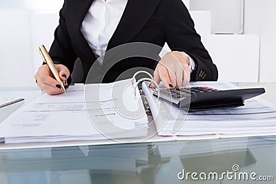 Accountant calculating tax Stock Photo