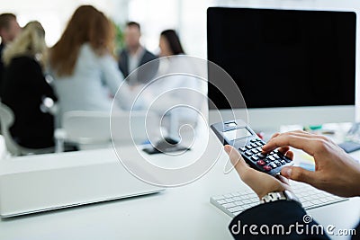 Accountant checking statistics of company Stock Photo