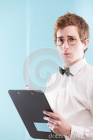 Accountant-like man in dated office suit, sad Stock Photo
