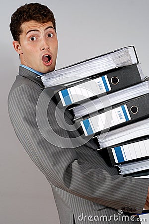 Accountant with pile of docume Stock Photo