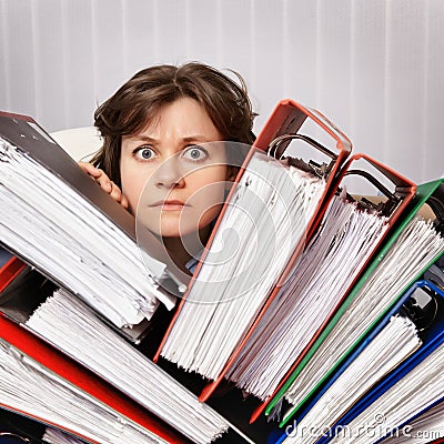 Accountant swamped with financial documents Stock Photo