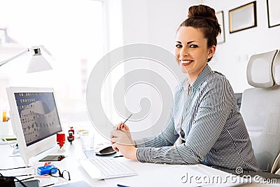 Accountant working in her office Stock Photo