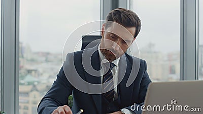 Accountant writing financial papers sitting at desk office closeup. Ceo thinking Stock Photo