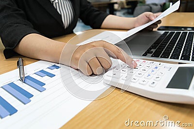 Accountants are examining the company`s finances to prepare business Stock Photo