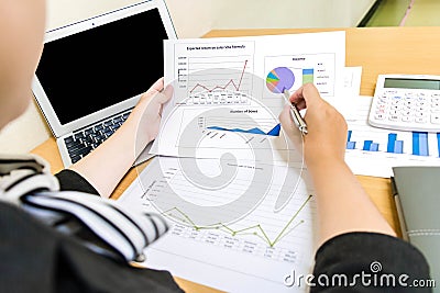 Accountants are examining the company`s finances to prepare business Stock Photo