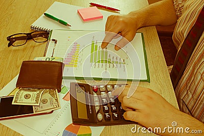 Accounting and business concept. Businessman working on office desk. Home finances, investment, economy, saving money or insurance Stock Photo