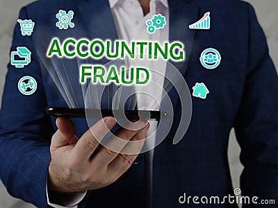 ACCOUNTING FRAUD inscription on the screen. Close up Loan officer hands holding black smart phone Stock Photo