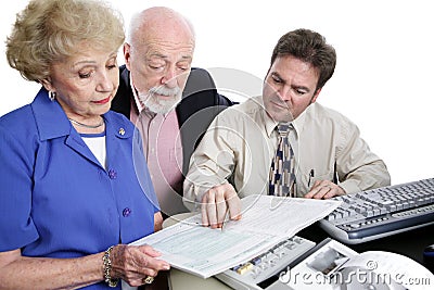 Accounting Series - Reviewing Tax Booklet Stock Photo