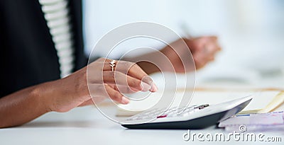 Accounting, woman and hand with calculator in office for company review, budget and analysis. Corporate, accountant and Stock Photo