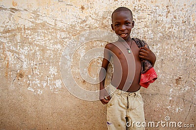 ACCRA, GHANA ï¿½ MARCH 18: Unidentified young african boy pose wi Editorial Stock Photo
