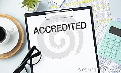 Accredited write on a paperwork isolated on office Stock Photo