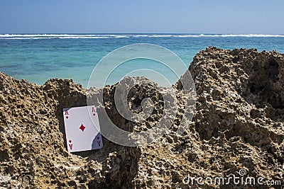 ace of diamond poker card beach theme Stock Photo