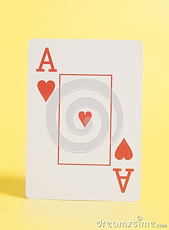 Ace of Heart Playing card on yellow Stock Photo