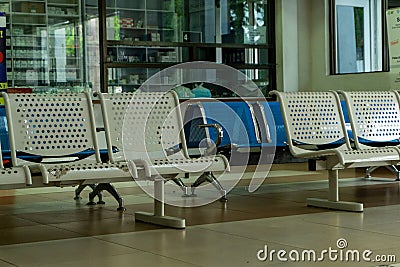 Waiting room at hospital. Hospital corridor chairs for patient Editorial Stock Photo