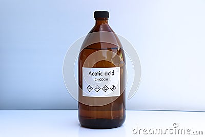 Acetic acid in bottle , chemical in the laboratory and industry Stock Photo