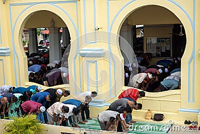 Acheh Mosque with Muslim praying. Editorial Stock Photo