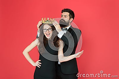 Achievement. Promotion and reward. Prom queen. Bearded man sexy girl. Royal party. Prom couple in formal style. Prom Stock Photo
