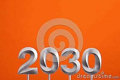 Achievements for the new year 2030 - Silver number on orange foamy Stock Photo