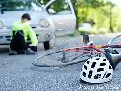 Aching man after bicycle accident Stock Photo