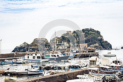 Acitrezza harbor with fisher boats next to Cyclops islands, Catania, Sicily, Italy Editorial Stock Photo