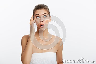 Acne spot pimple spot skincare beauty care girl pressing on skin problem face. Woman with skin blemish isolated, white Stock Photo