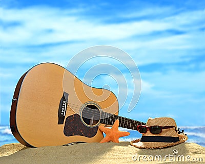 Acoustic guitar on the beach Stock Photo