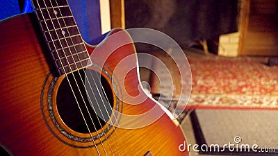 Acoustic Guitar on a Dark Background Stock Photo