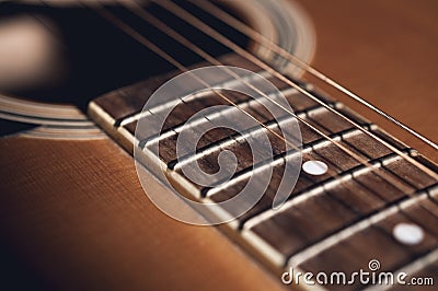 An acoustic guitar detail with dark vignette Stock Photo