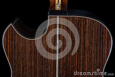 Acoustic Guitar Rosewood Back with Inlaid Abalone Hand Cut Soundhole Cutaway Stock Photo