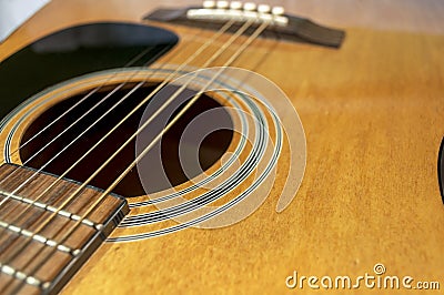 Acoustic guitar with sound hole and pickguard Stock Photo
