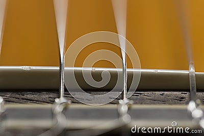 Acoustic guitar strings macro closeup Stock Photo