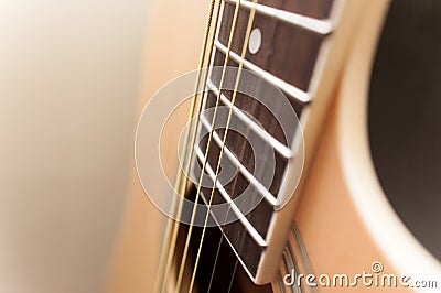 Acoustic yellow guitar close up Stock Photo