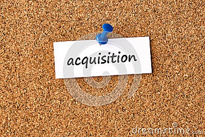 Acquisition. Word written on a piece of paper, cork board background Stock Photo