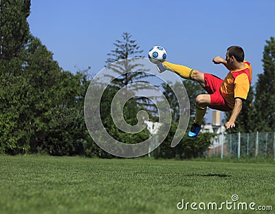 Acrobatic soccer player Stock Photo