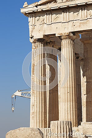 Acropolis of Athens. Parthenon columns and crane. Greece Stock Photo