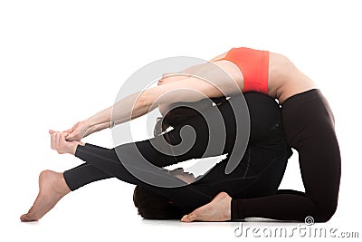 Acroyoga, Camel with Plow Pose Stock Photo