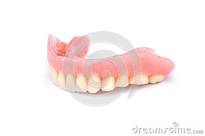 Acrylic dentures isolated on white background. Removable dentures flexible. False teeth Stock Photo