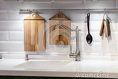 Acrylic kitchen sink built into the countertop Stock Photo