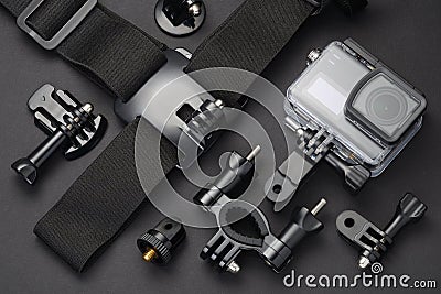 Action camera in waterproof housing and accessories Stock Photo