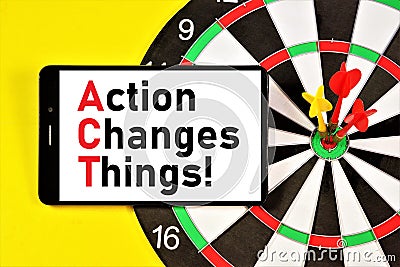 Action changes things. A widget for displaying text messages on the background of the target Darts. Stock Photo