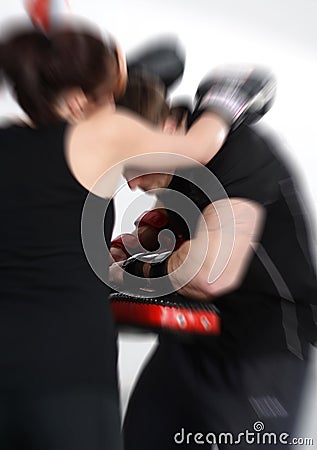 Action shot of girl working out Stock Photo