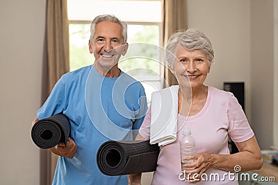 Active elderly couple ready for yoga Stock Photo