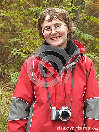 Active hiking girl with digital camera Stock Photo