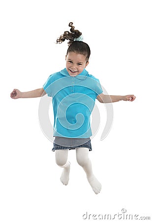 Active Joyful Young Girl Jumping with Joy Stock Photo