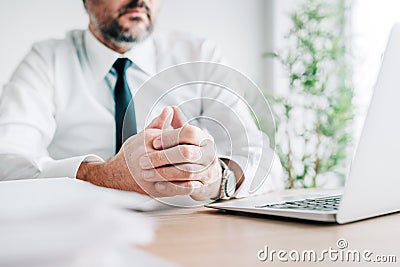 Active listening, focused businessman paying close attention to a speaker of online business course Stock Photo