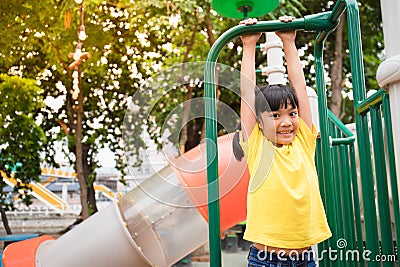 Active little girl on playground Stock Photo