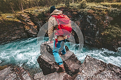 Active man hiker traveling with backpack alone Stock Photo