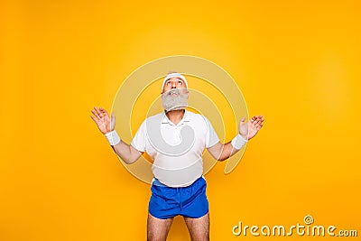 Active modern cool competetive pensioner, leader, champion with Stock Photo