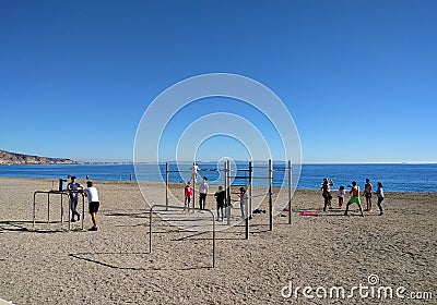 Active people on the beach of Aguadulce. Spain Editorial Stock Photo